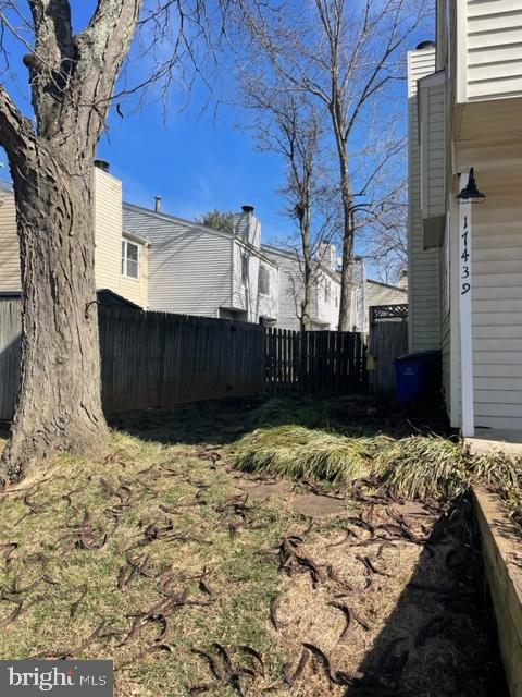 17439 Hughes Road Poolesville, MD 20837 - Photo 24 of 25 a view of a yard with wooden fence