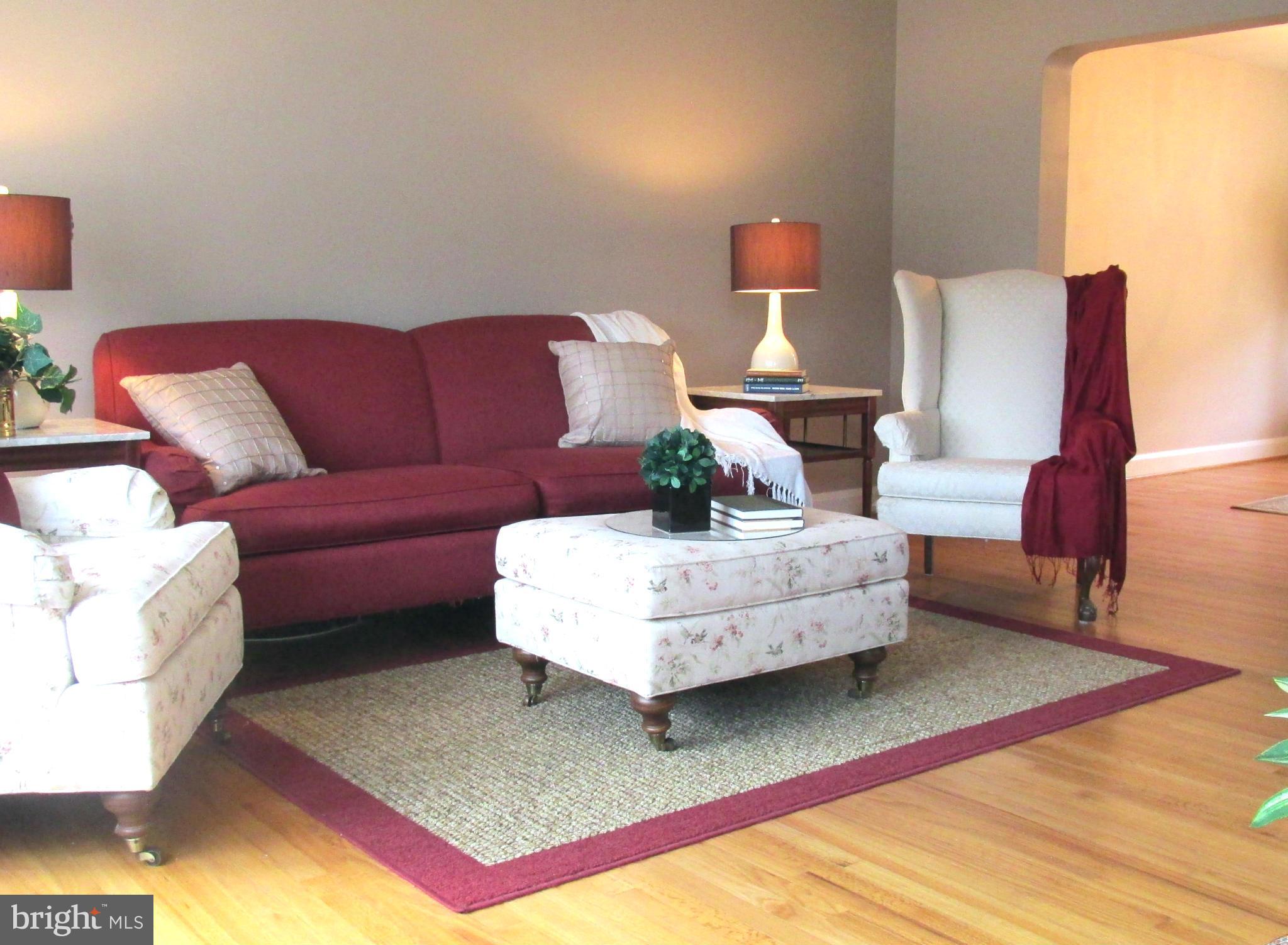1512 Doxbury Road Baltimore, MD 21286 - Photo 2 of 24 a living room with furniture and a couch