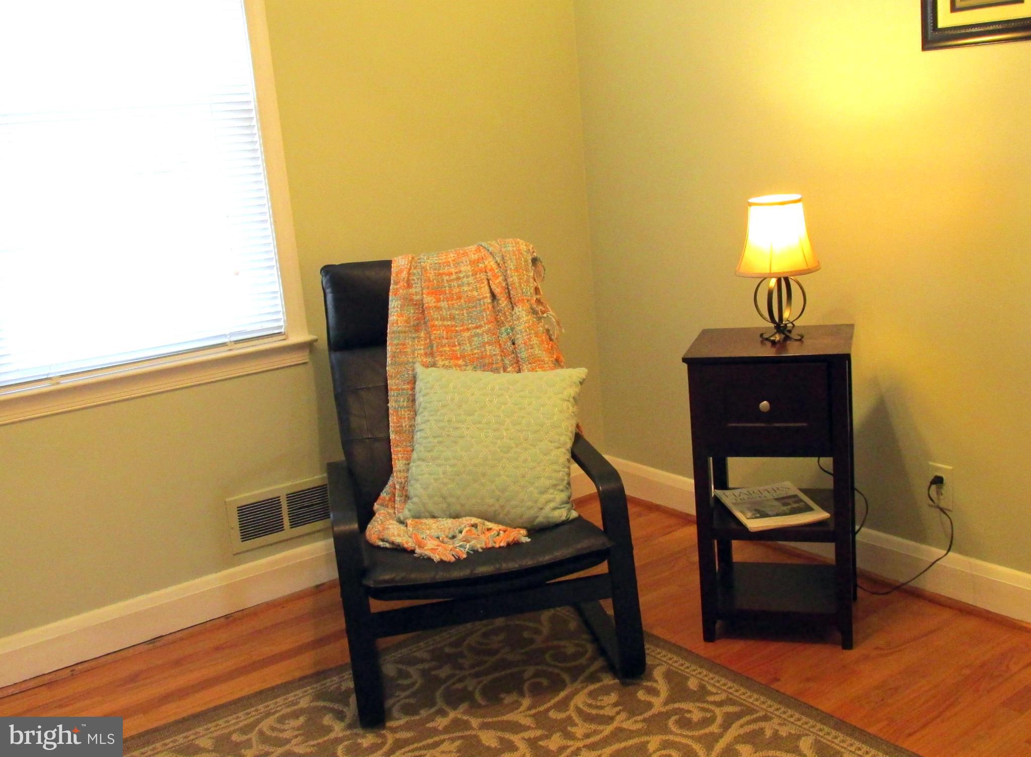 1512 Doxbury Road Baltimore, MD 21286 - Photo 14 of 24 a living room with furniture and wooden floor