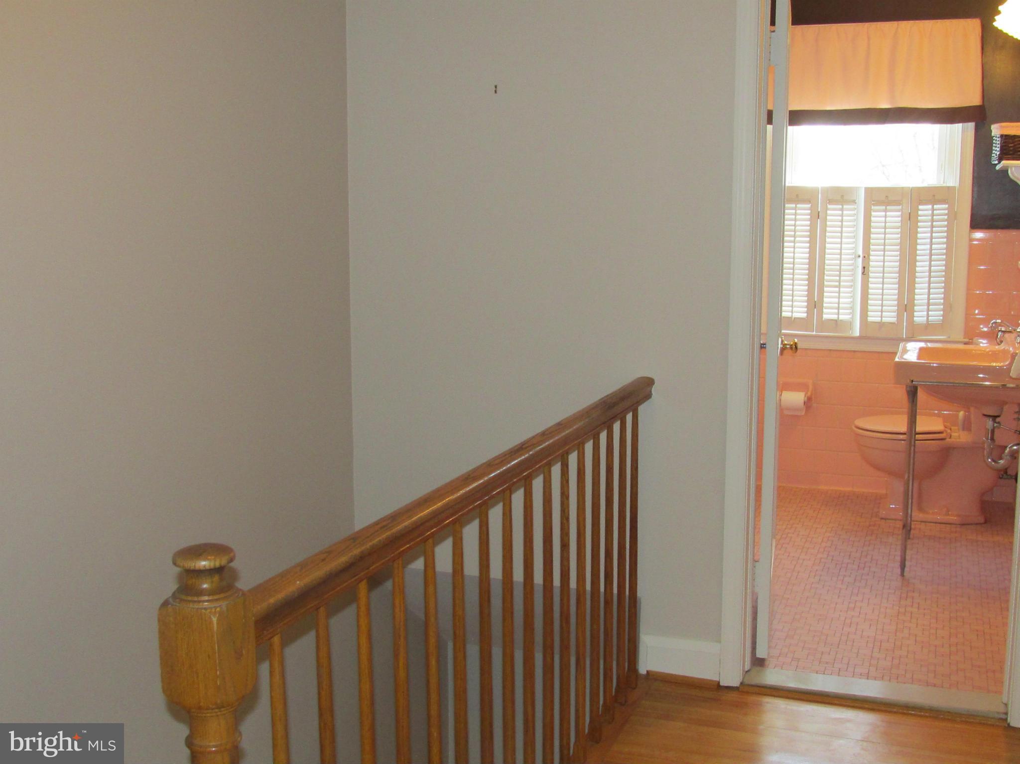 1512 Doxbury Road Baltimore, MD 21286 - Photo 15 of 24 a view of a hallway with windows