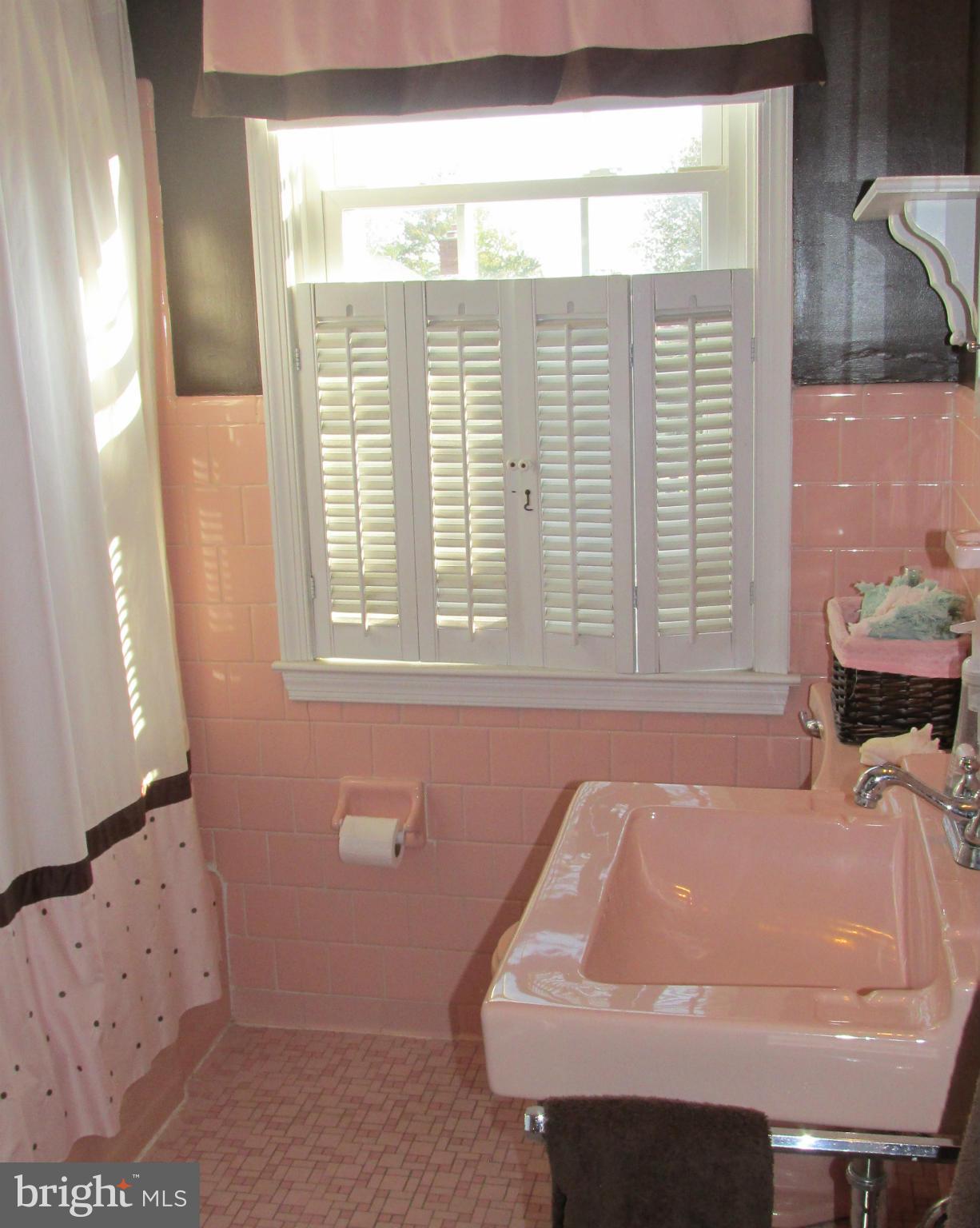 1512 Doxbury Road Baltimore, MD 21286 - Photo 16 of 24 a bathroom with a sink and a window