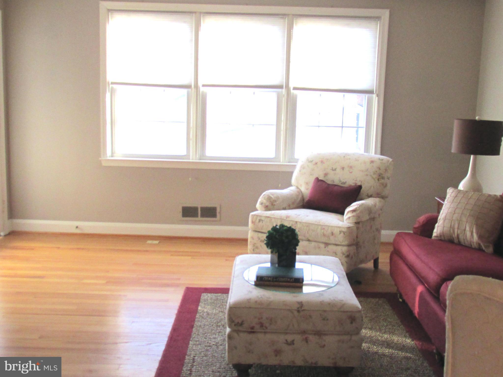 1512 Doxbury Road Baltimore, MD 21286 - Photo 3 of 24 a living room with furniture and a window