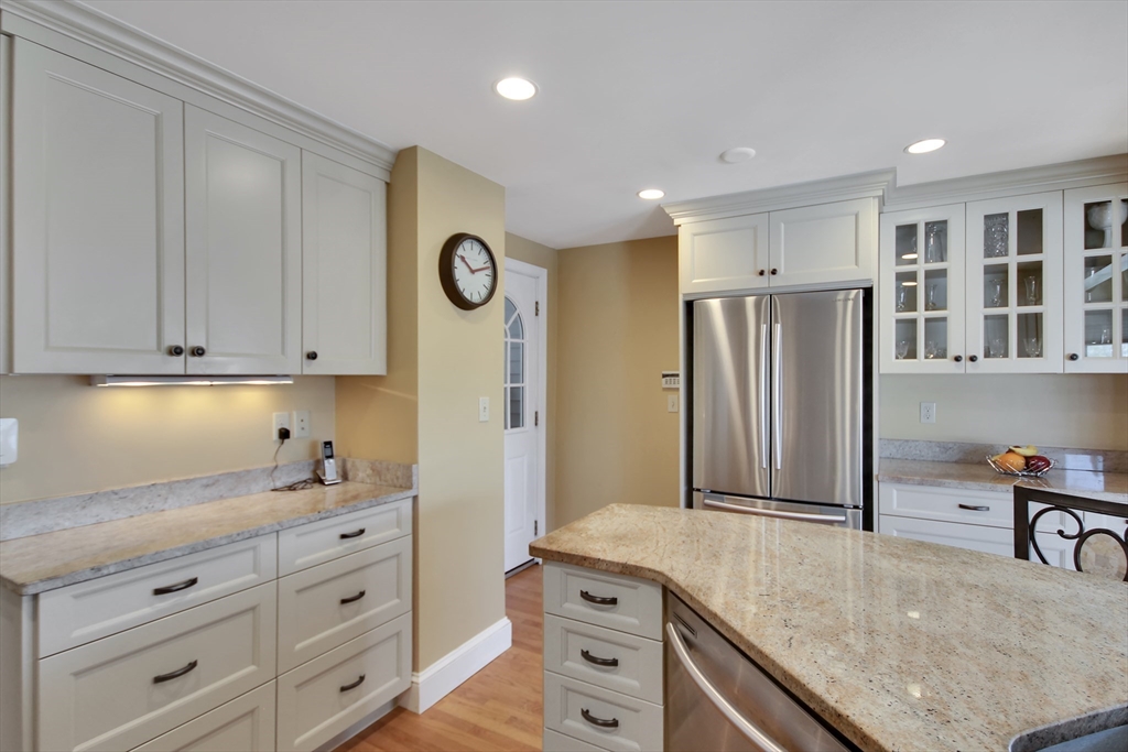 106 Channing Road Watertown, MA 02472 - Photo 15 of 39 a kitchen with cabinets stainless steel appliances and a counter space