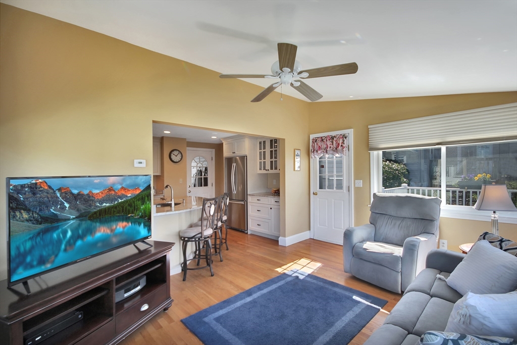 106 Channing Road Watertown, MA 02472 - Photo 17 of 39 a living room with furniture and a flat screen tv