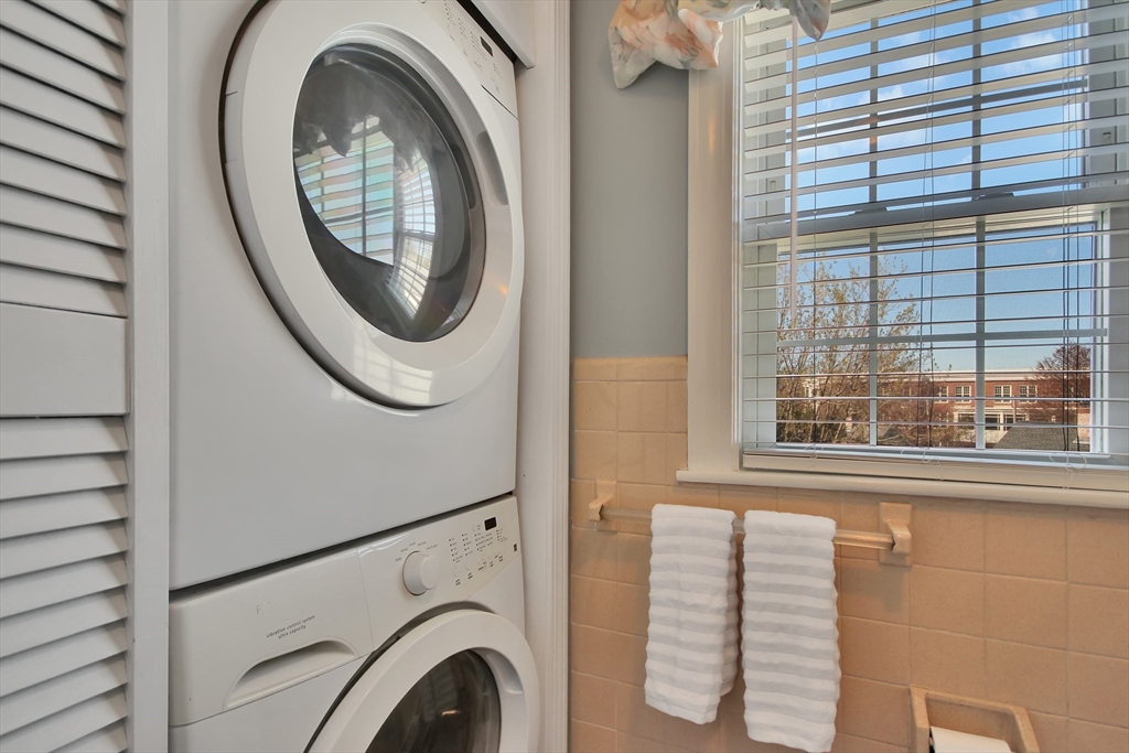 106 Channing Road Watertown, MA 02472 - Photo 20 of 39 a close up of a washer and dryer
