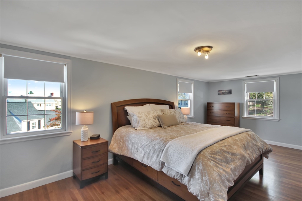 106 Channing Road Watertown, MA 02472 - Photo 21 of 39 a bedroom with a bed and window