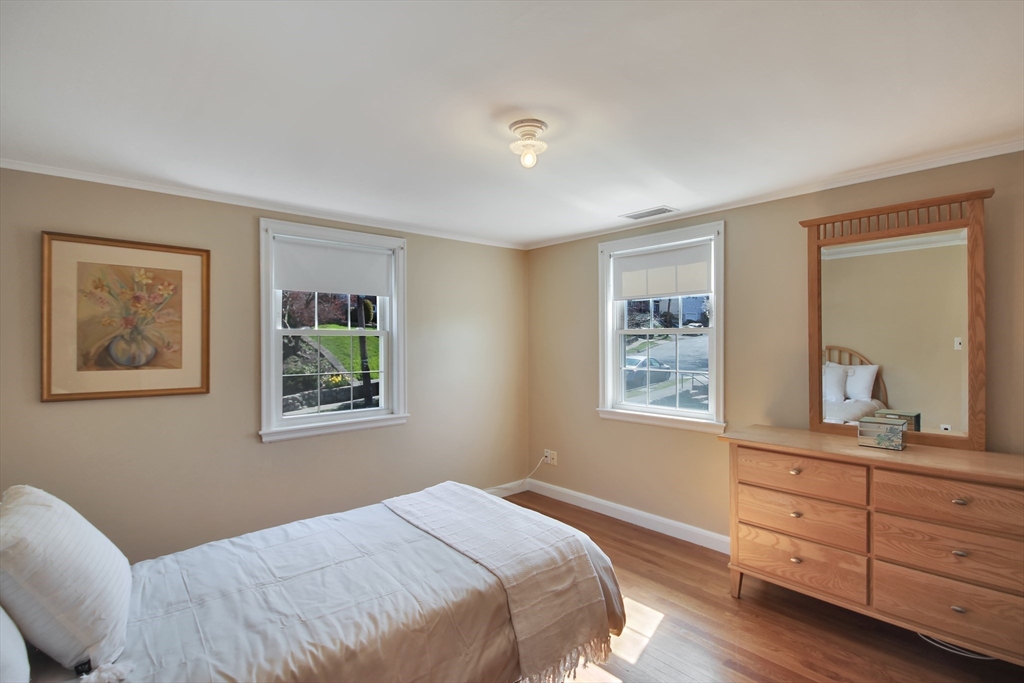 106 Channing Road Watertown, MA 02472 - Photo 26 of 39 a bedroom with a bed and a window