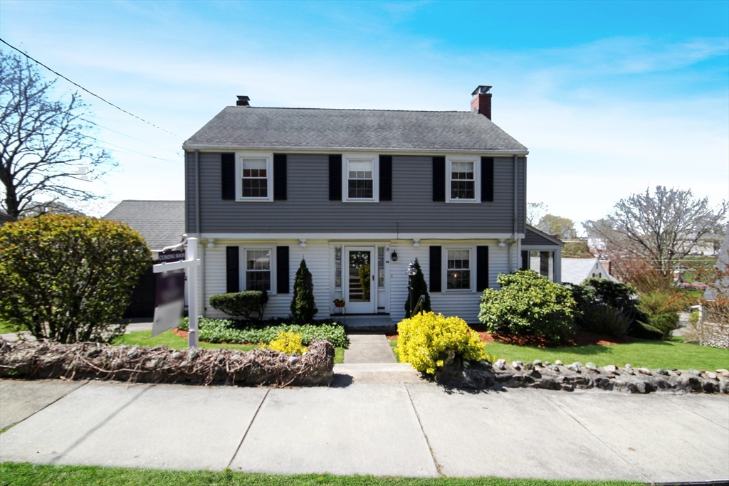 106 Channing Road Watertown, MA 02472 - Photo 35 of 39 a front view of a house with a garden