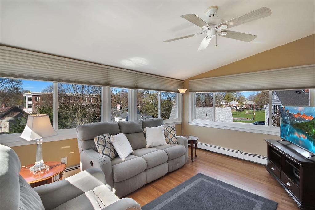 106 Channing Road Watertown, MA 02472 - Photo 4 of 39 a living room with furniture and a large window