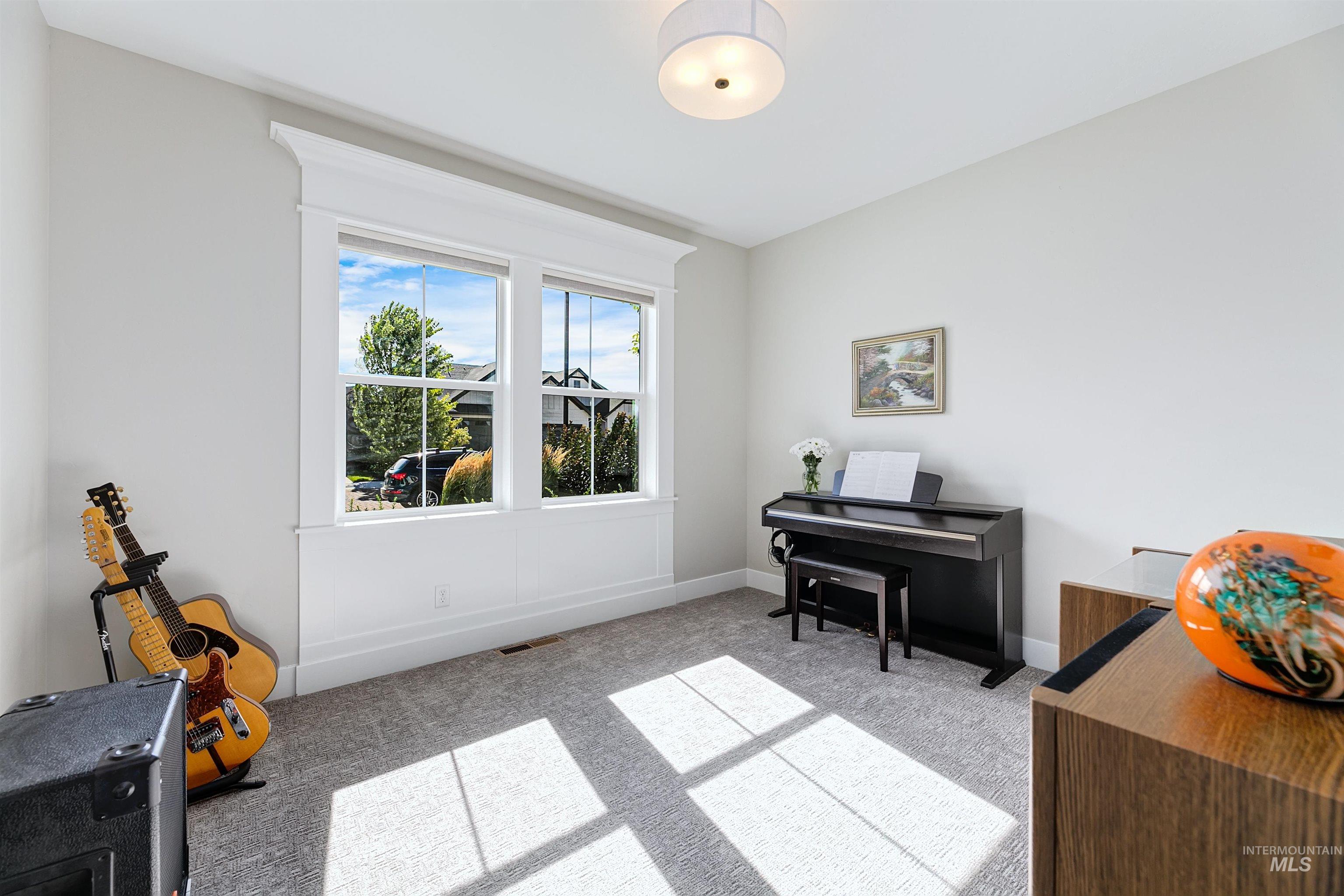 5463 North Exeter Way Meridian, ID 83646 - Photo 11 of 36 Downstairs bedroom that can also be used as an office and more.