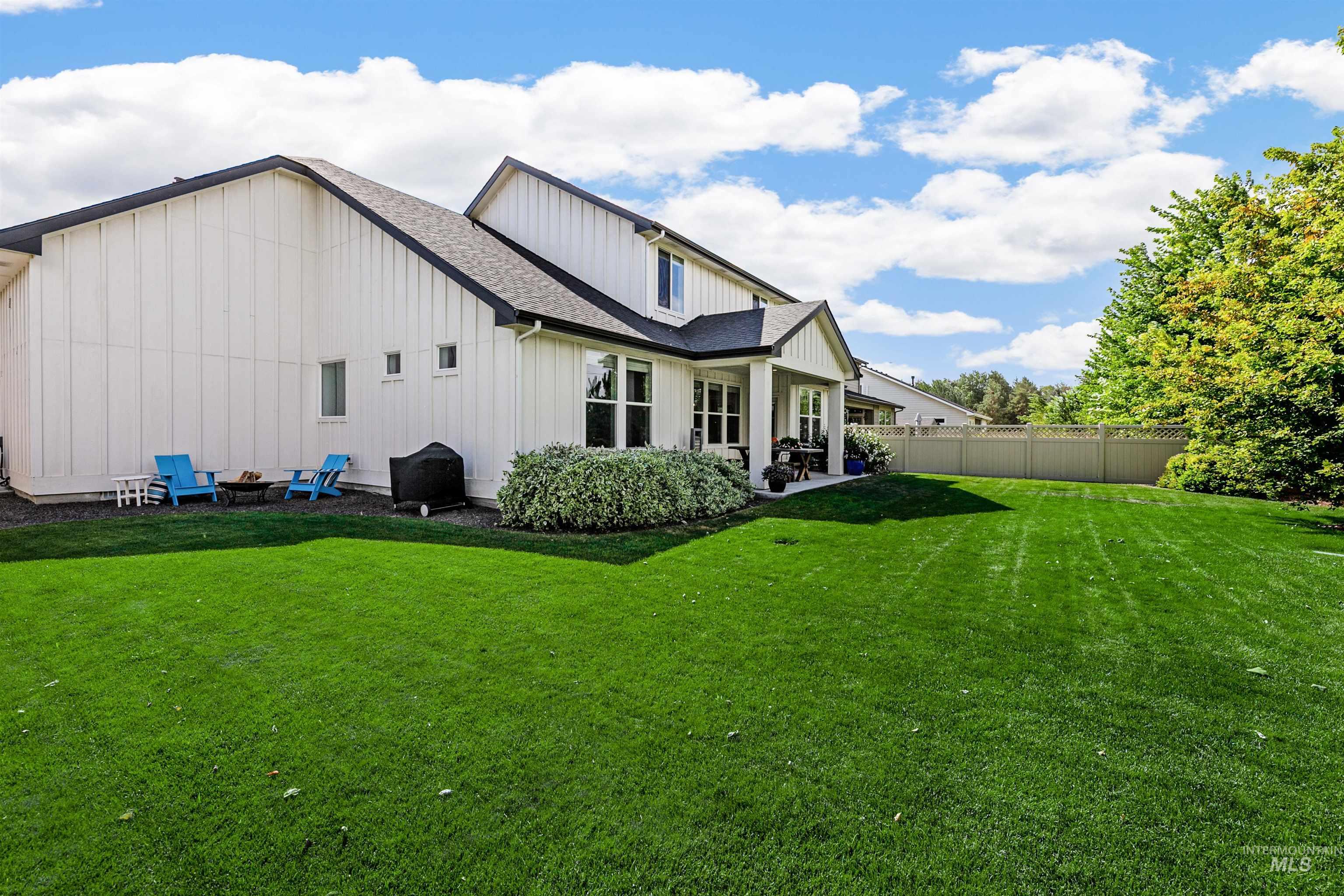 5463 North Exeter Way Meridian, ID 83646 - Photo 19 of 36 Back of house with pocket patio perfect for a fire pit.