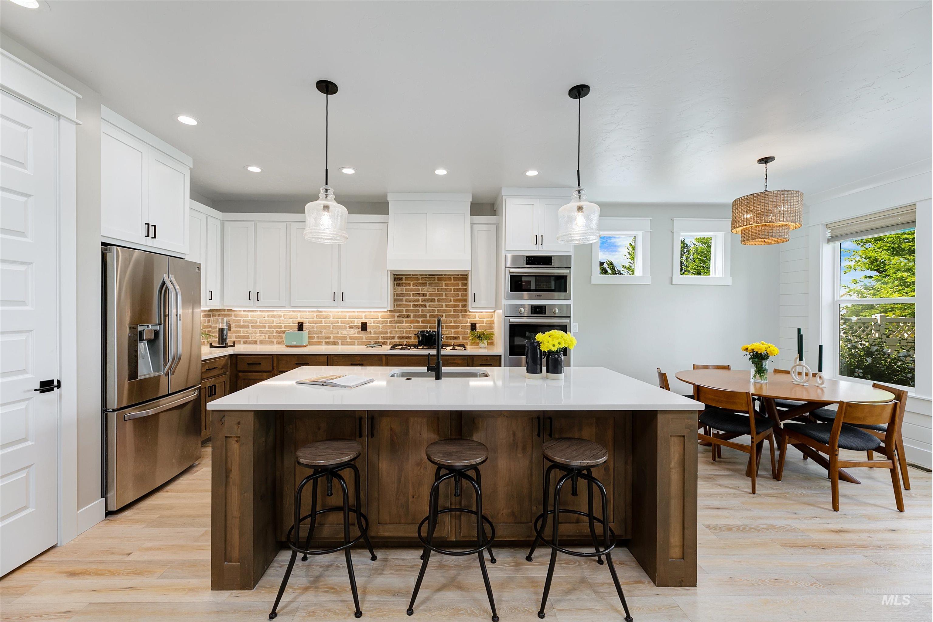 5463 North Exeter Way Meridian, ID 83646 - Photo 2 of 36 Oversized kitchen island with ample cabinet space.