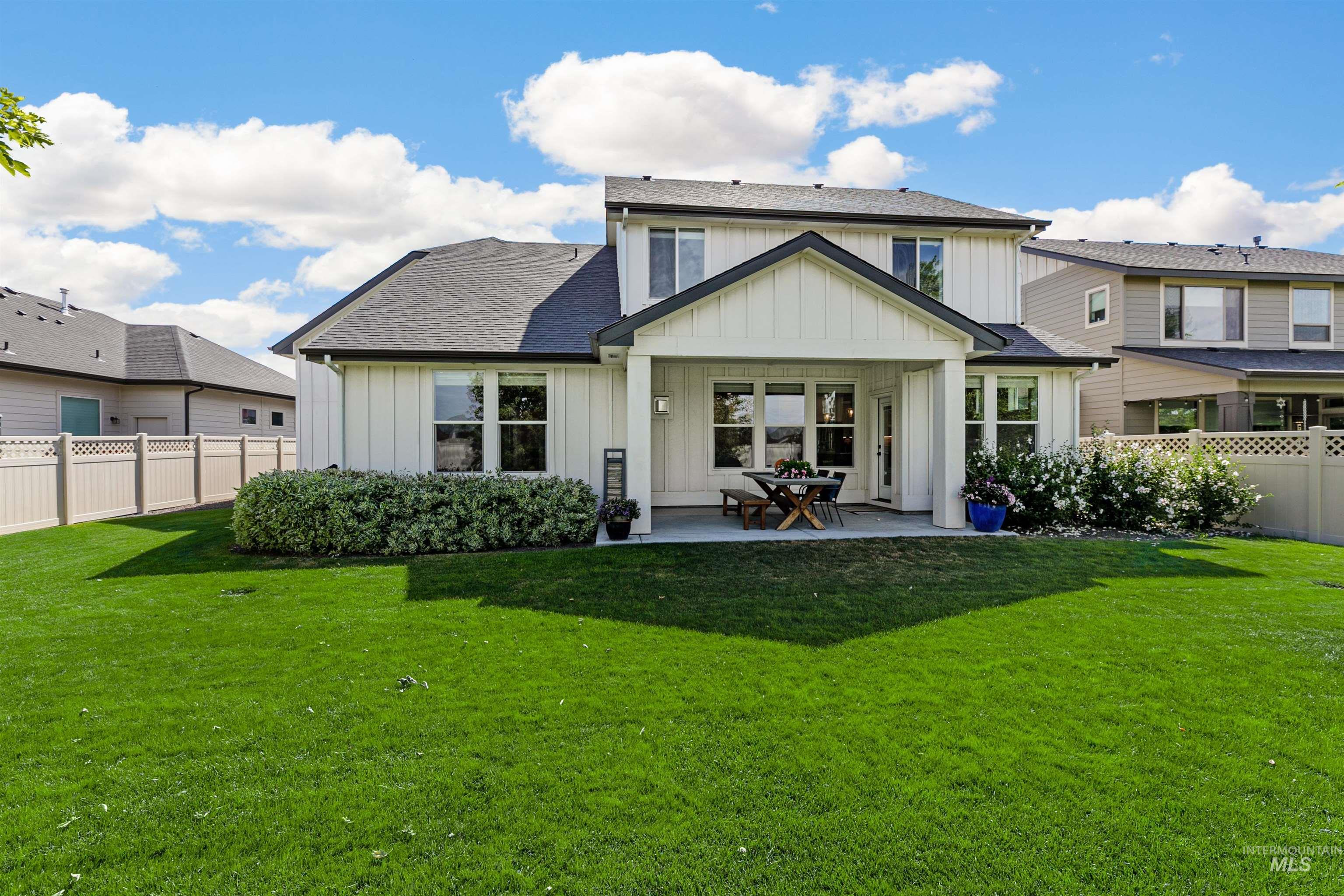 5463 North Exeter Way Meridian, ID 83646 - Photo 26 of 36 Beautifully landscaped and fenced with gates on both sides.