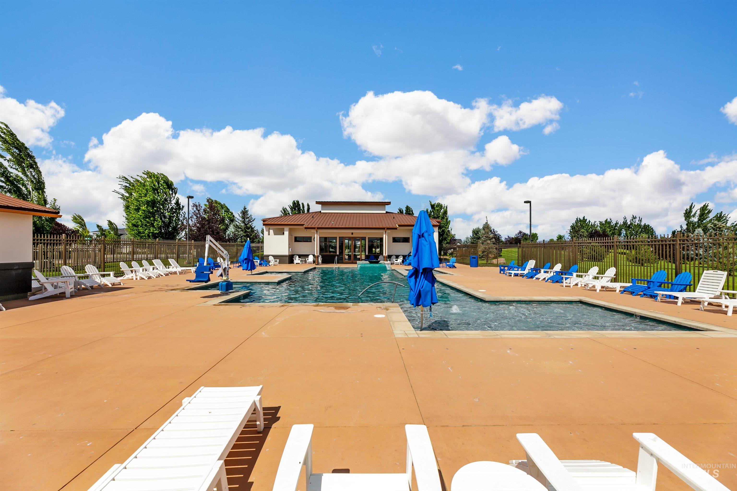 5463 North Exeter Way Meridian, ID 83646 - Photo 28 of 36 Community pool featuring a spacious and lovely patio area.