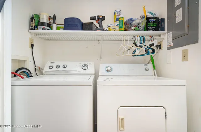 a utility room with dryer and washer