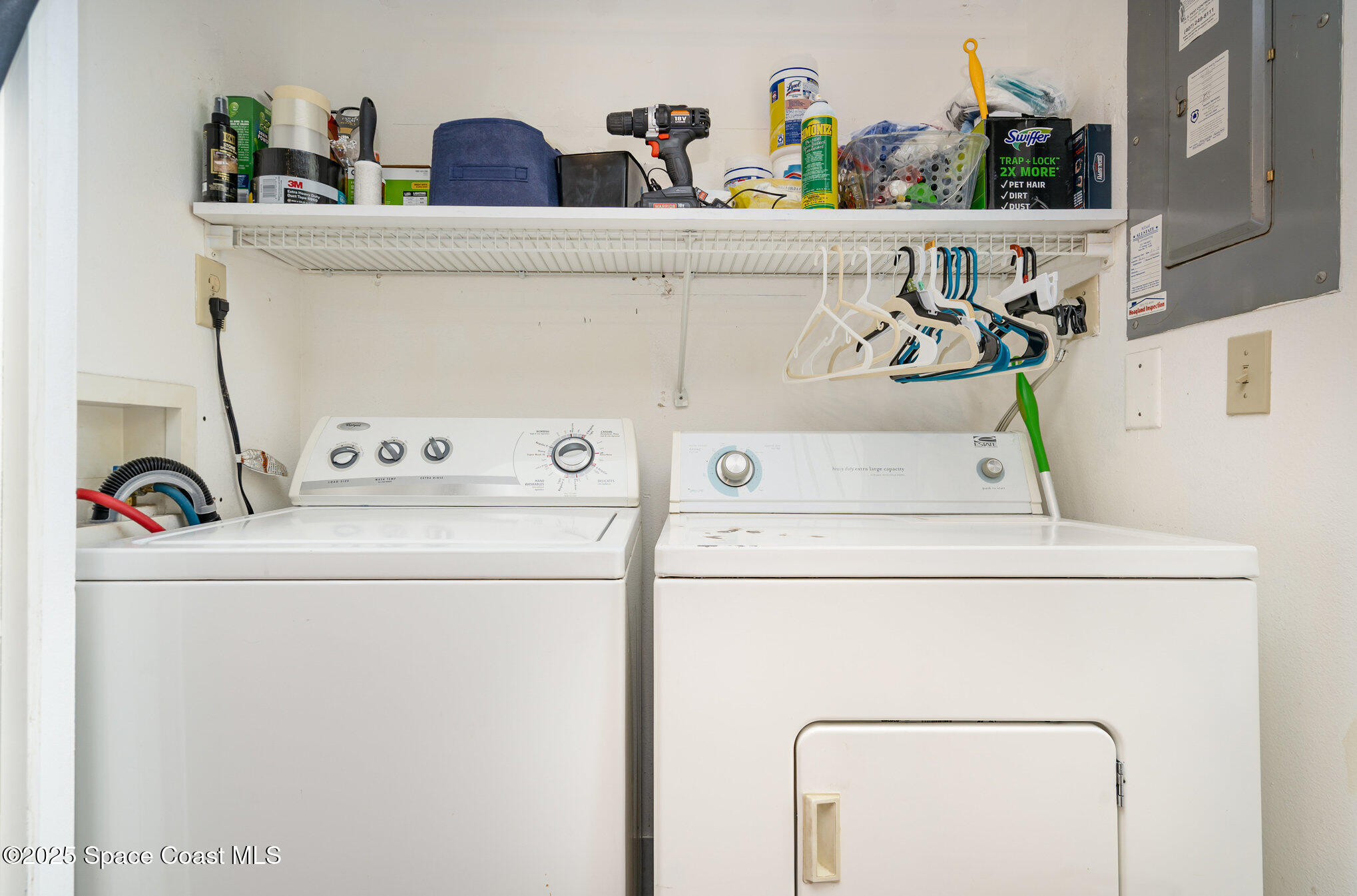 1010 Abada Court Northeast, Unit 102 Palm Bay, FL 32905 - Photo 23 of 37 a utility room with dryer and washer