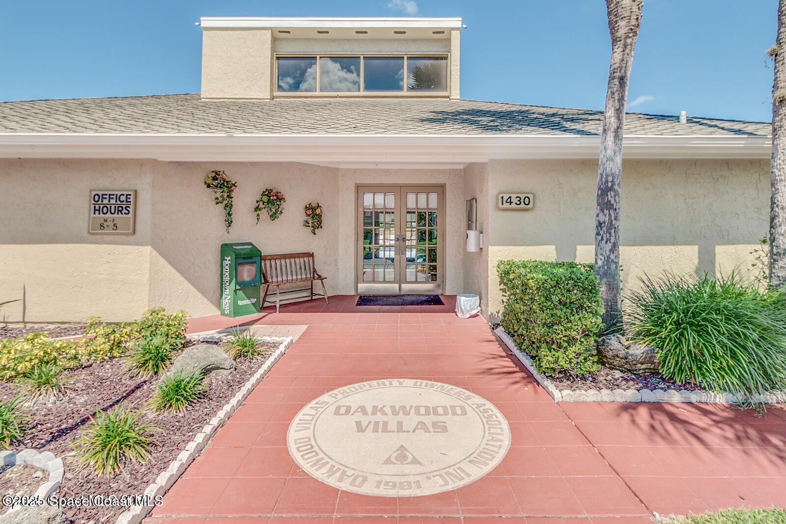 1010 Abada Court Northeast, Unit 102 Palm Bay, FL 32905 - Photo 25 of 37 a view of a house with potted plants