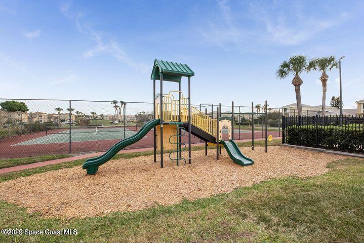 1010 Abada Court Northeast, Unit 102 Palm Bay, FL 32905 - Photo 32 of 37 a view of a park with a slide
