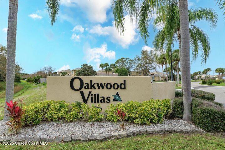 1010 Abada Court Northeast, Unit 102 Palm Bay, FL 32905 - Photo 33 of 37 a sign on the side of a road