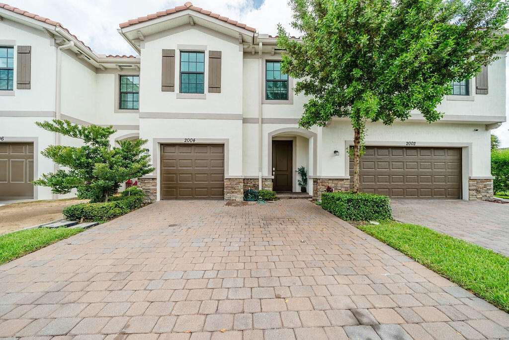 2004 Sugar Maple Drive Riviera Beach, FL 33410 - Photo 25 of 37 Front Elevation