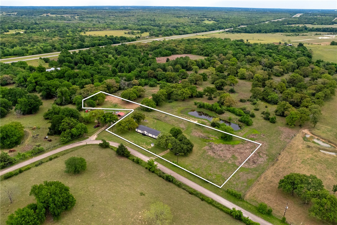 11459 Winstead Lane Calvert, TX 77837 - Photo 34 of 37 an aerial view of lake with residential houses with outdoor space
