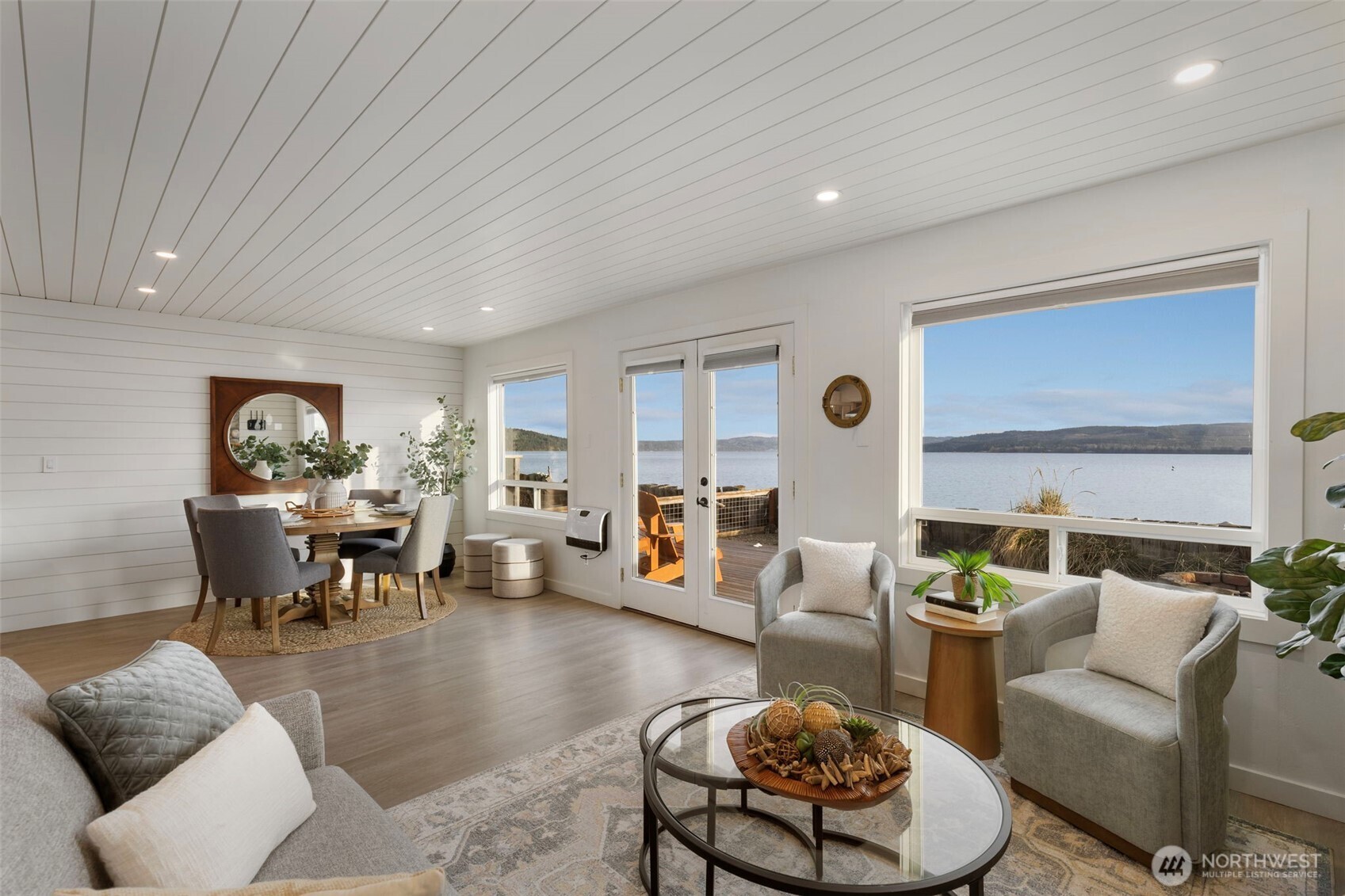 1180 Beckett Point Road Port Townsend, WA 98368 - Photo 13 of 31 a living room with furniture and a table