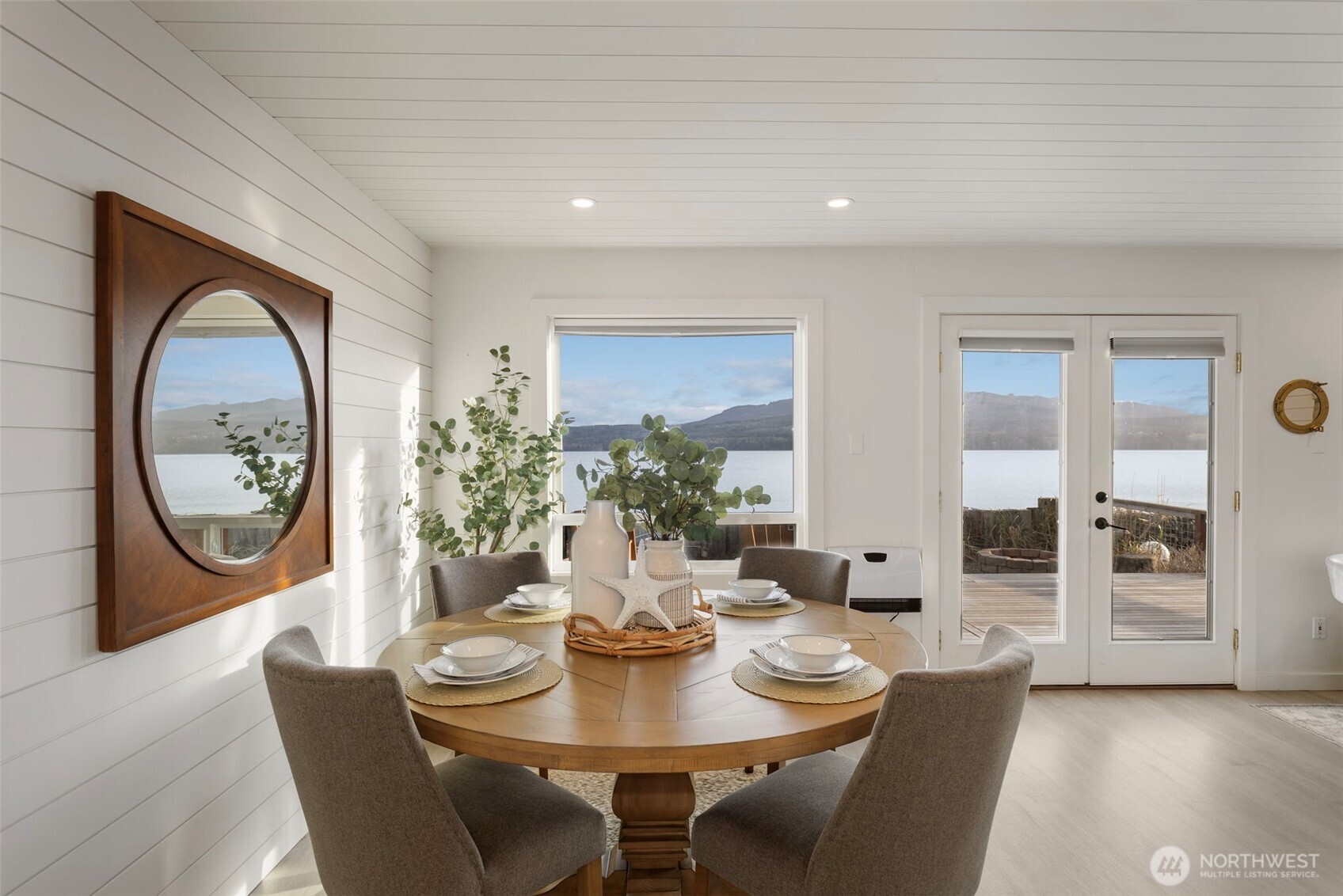1180 Beckett Point Road Port Townsend, WA 98368 - Photo 15 of 31 a dining room with furniture and window