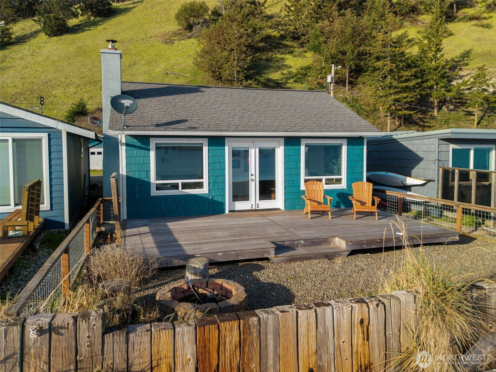 1180 Beckett Point Road Port Townsend, WA 98368 - Photo 27 of 31 a view of a house with backyard and sitting area