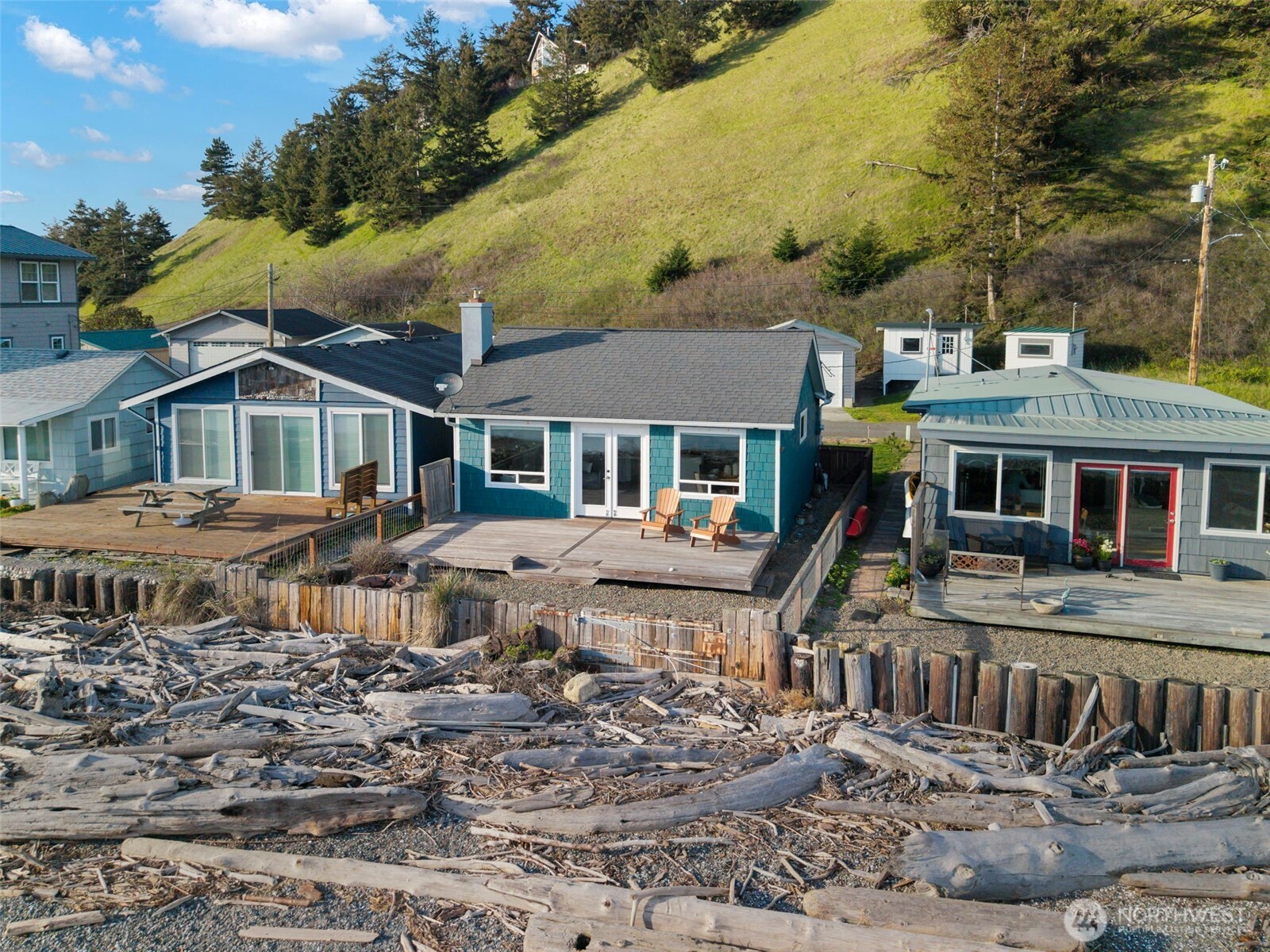 1180 Beckett Point Road Port Townsend, WA 98368 - Photo 4 of 31 a front view of a house with a yard