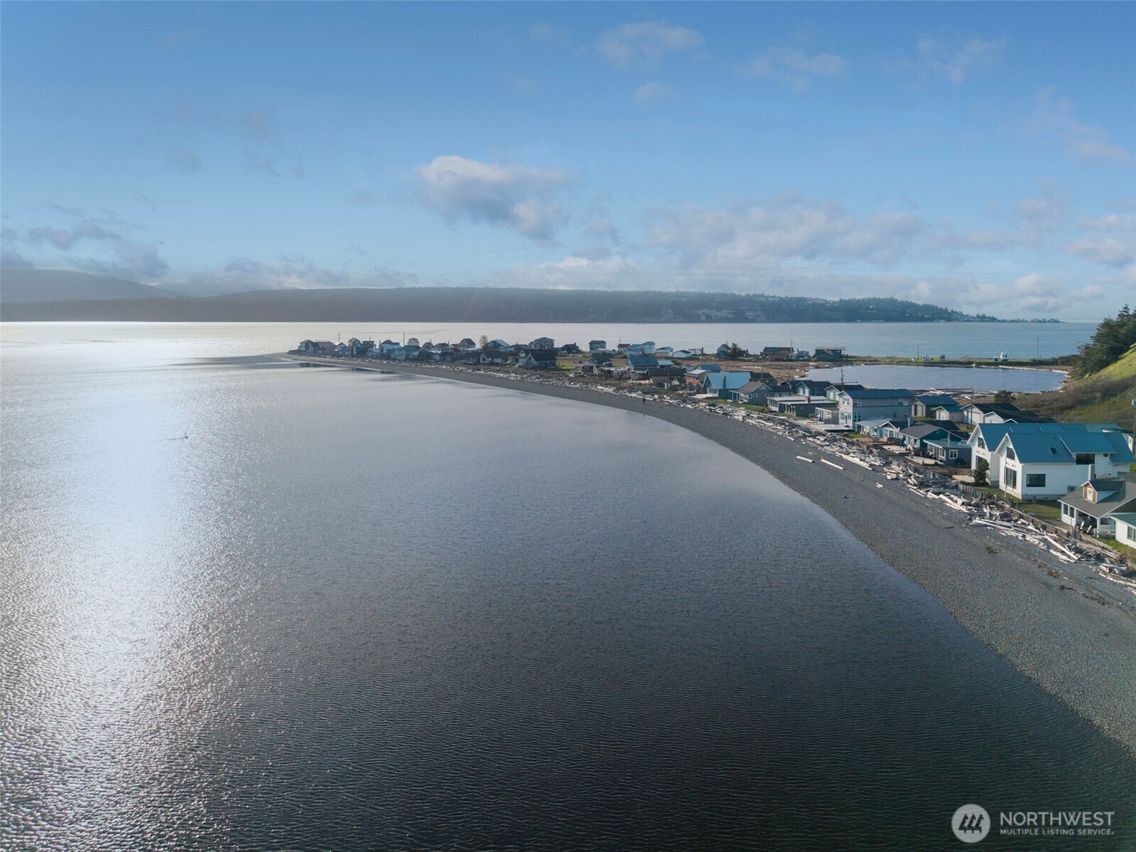 1180 Beckett Point Road Port Townsend, WA 98368 - Photo 5 of 31 a view of a water heater and a bench in a room