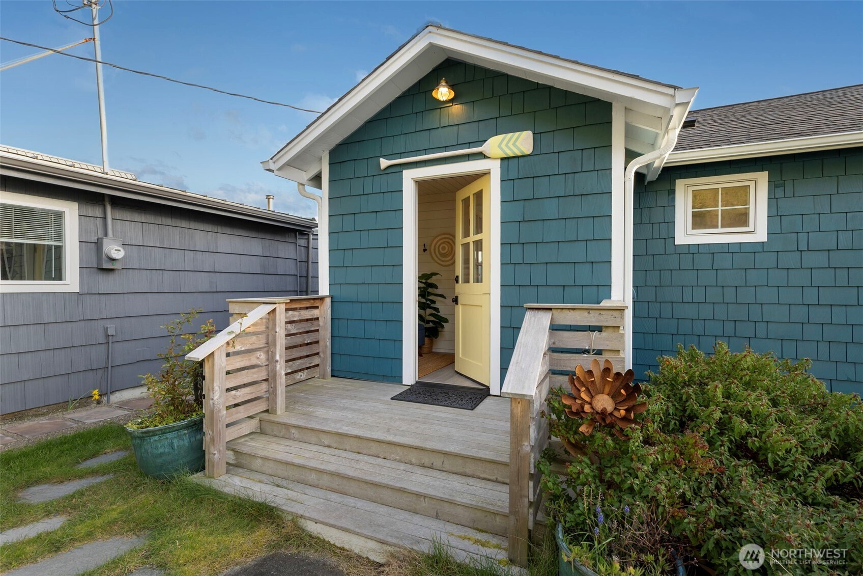 1180 Beckett Point Road Port Townsend, WA 98368 - Photo 8 of 31 a front view of a house with a garden