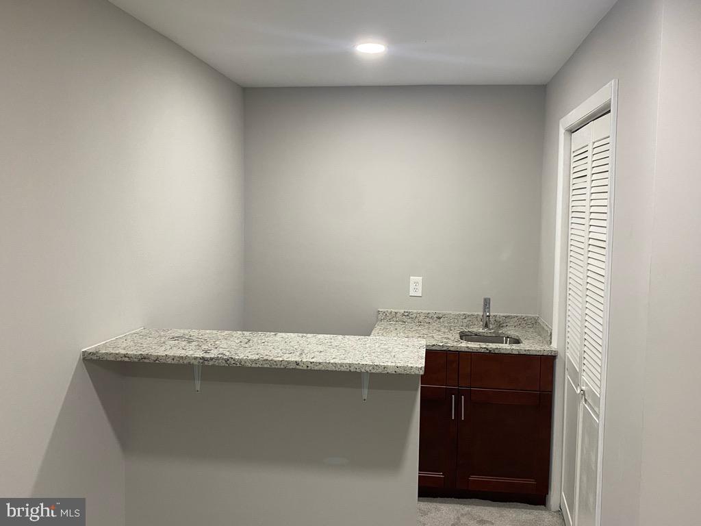 8211 Cagle Road Fort Washington, MD 20744 - Photo 29 of 49 Nice granite top with sink & vanity