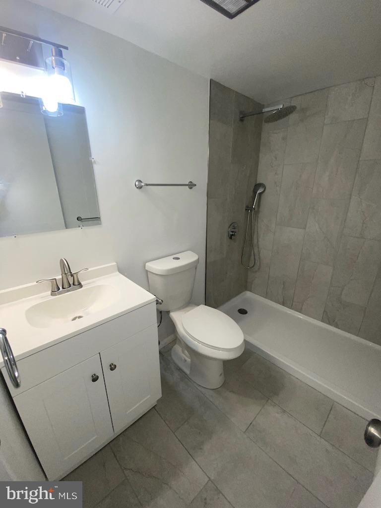 8211 Cagle Road Fort Washington, MD 20744 - Photo 31 of 49 Nice wall tile & shower head in Basement Bathroom