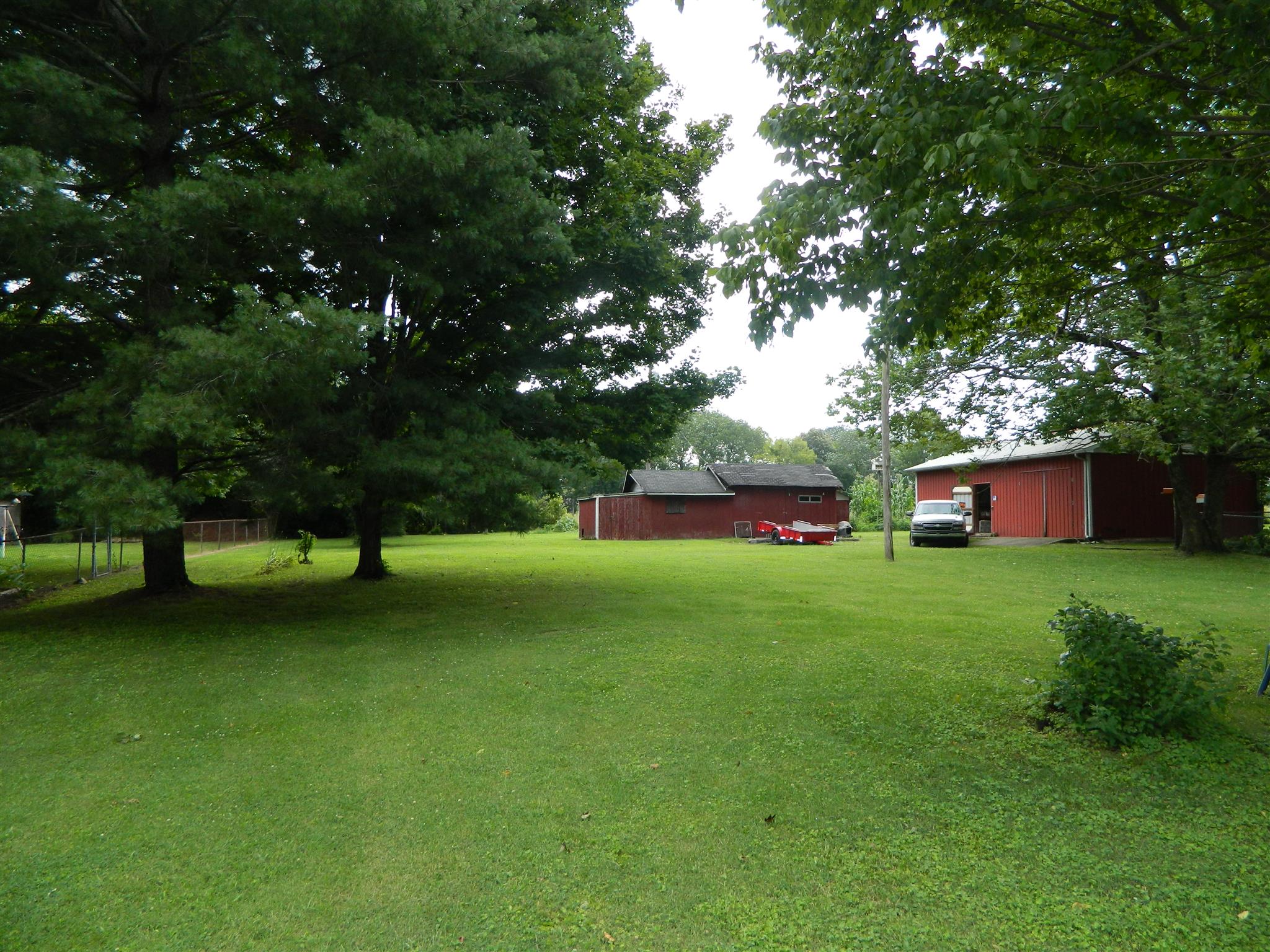 2053 Lake Road Greenbrier, TN 37073 - Photo 11 of 20 a view of a backyard with a garden