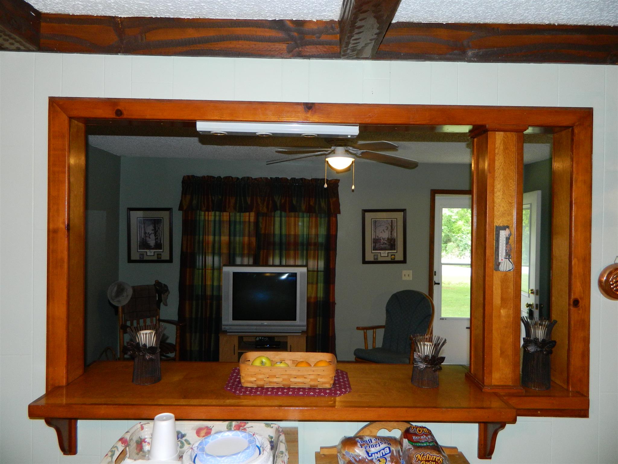2053 Lake Road Greenbrier, TN 37073 - Photo 13 of 20 a living room with furniture a flat screen tv and a fireplace