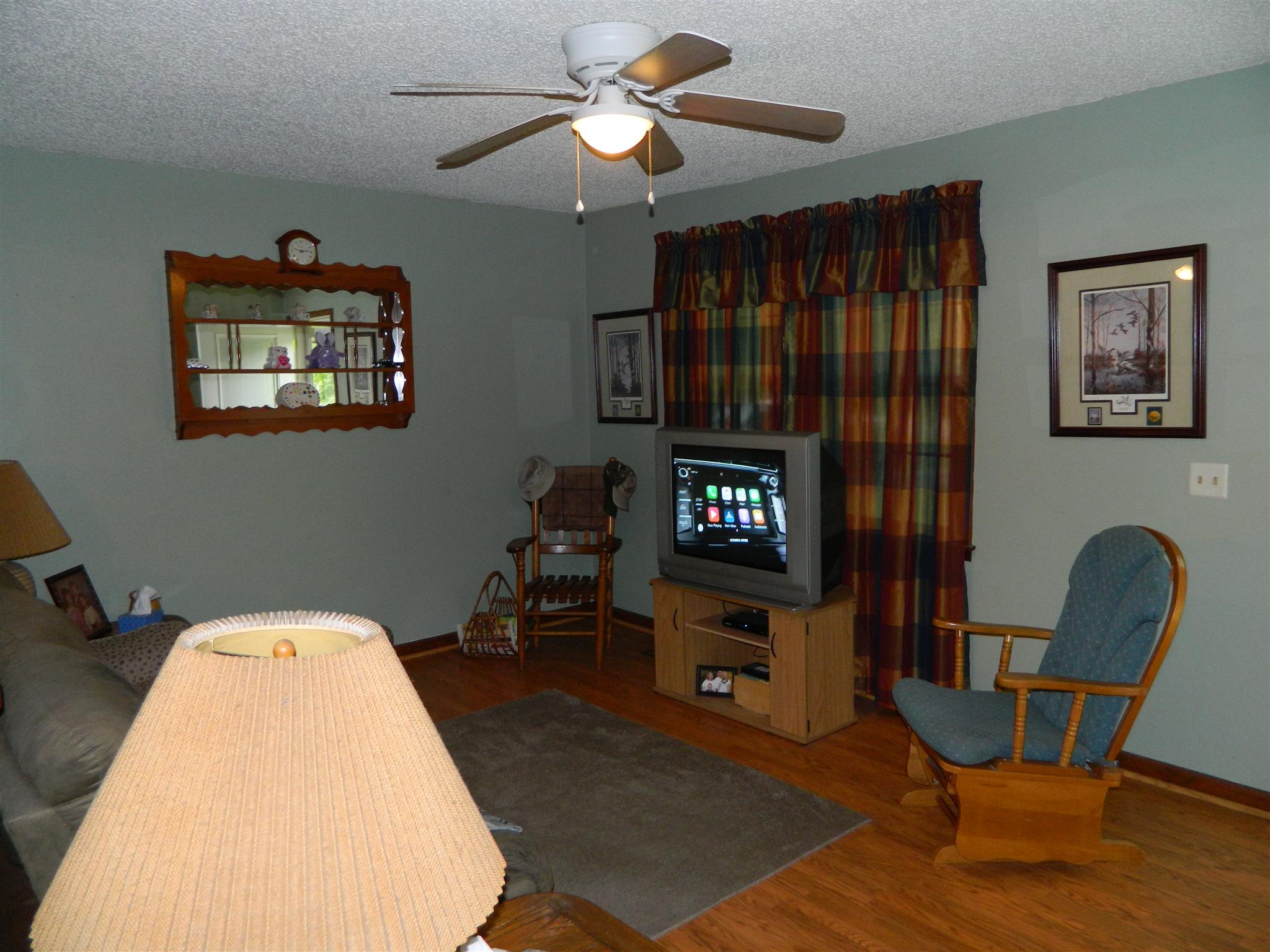 2053 Lake Road Greenbrier, TN 37073 - Photo 20 of 20 a living room with furniture and a flat screen tv