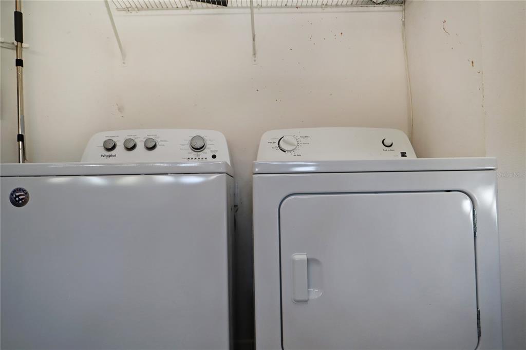 8211 Fan Palm Way Kissimmee, FL 34747 - Photo 41 of 41 a utility room with dryer and washer