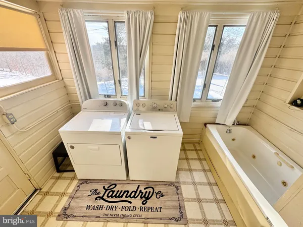 a bathroom with a sink and a bathtub