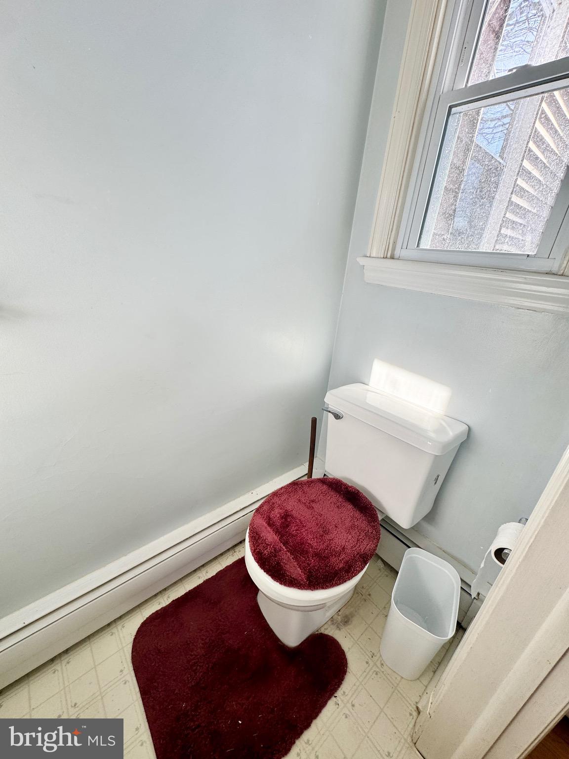 2847 Baltimore Boulevard, Unit B Finksburg, MD 21048 - Photo 6 of 25 a bathroom with a toilet and a mirror