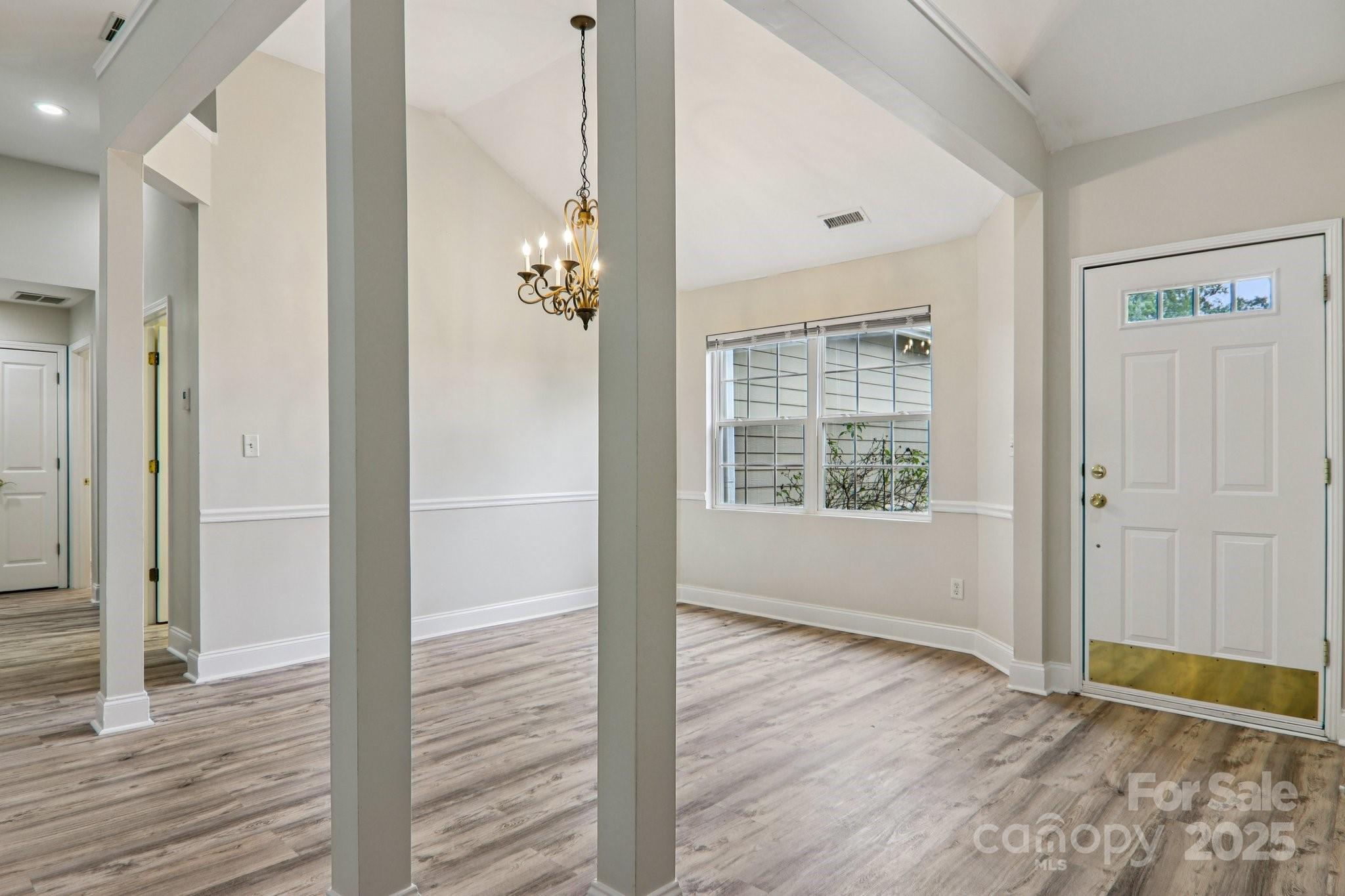 10 Grove End Road Fletcher, NC 28732 - Photo 8 of 32 a view of an entryway with wooden floor