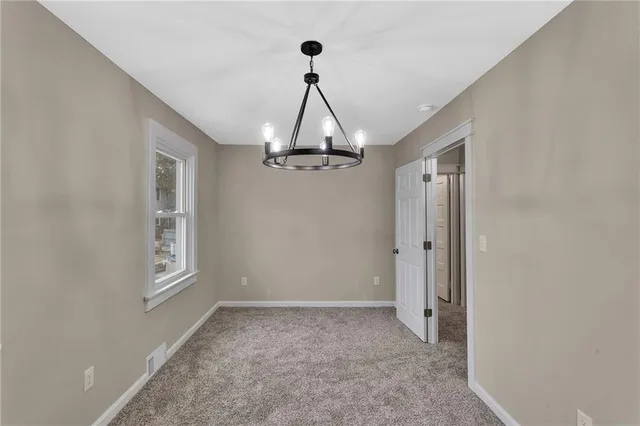 a view of a livingroom with a chandelier