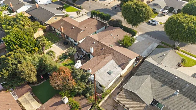 an aerial view of a house with a garden