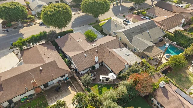 an aerial view of residential building with parking space