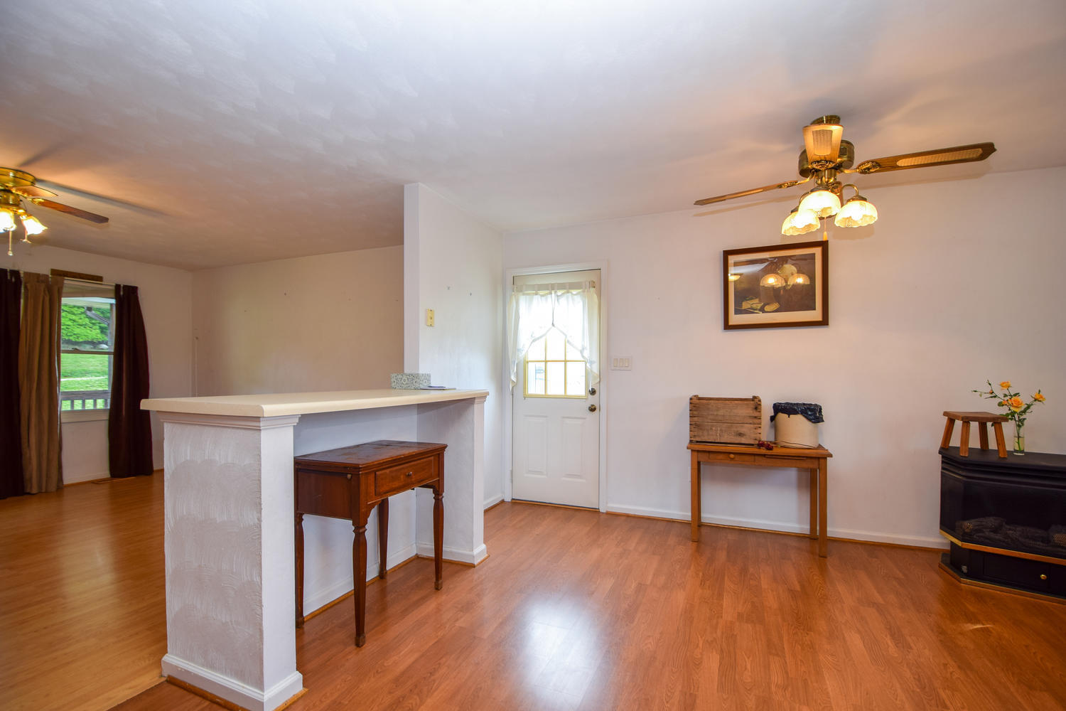 1167 Mill Iron Road Goodview, VA 24095 - Photo 4 of 19 a view of a livingroom with furniture and a fireplace