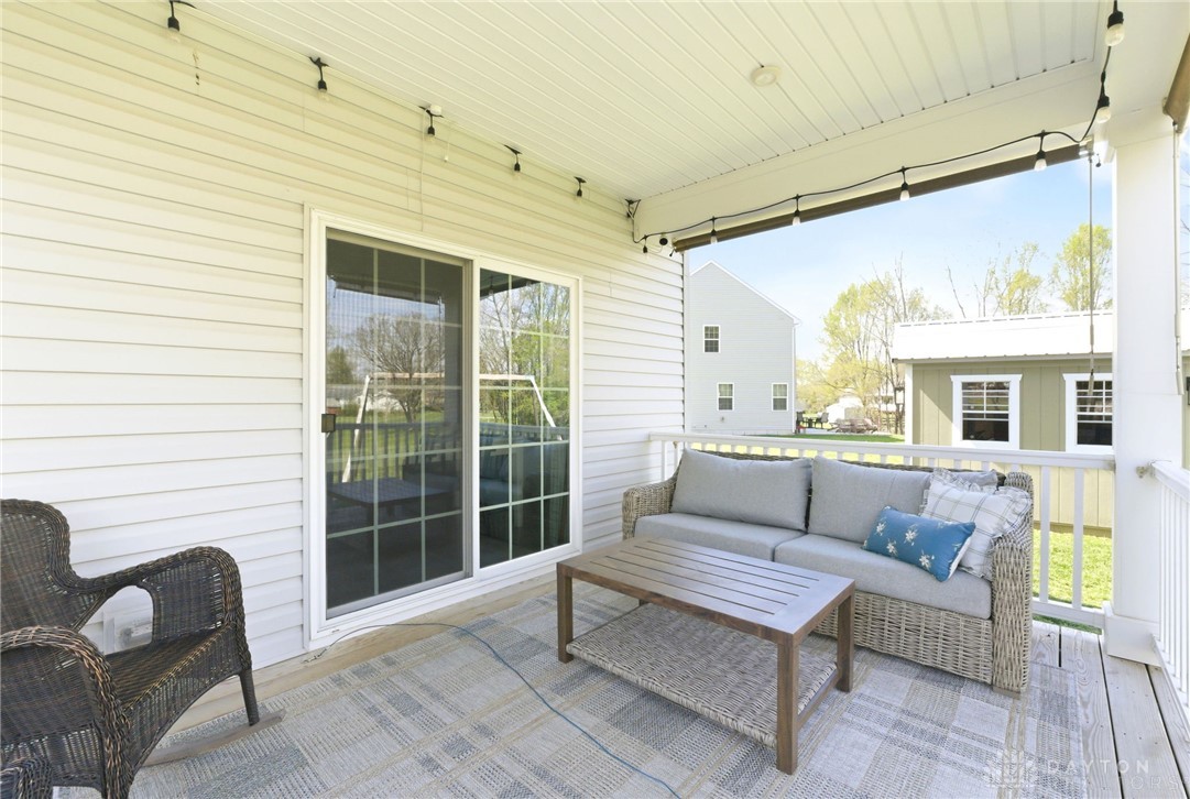 7900 Timberview Court Franklin, OH 45005 - Photo 49 of 60 This inviting porch area offers a delightful space for relaxation and outdoor enjoyment.