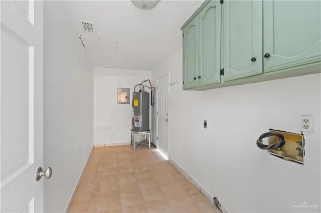 a view of a storage and utility room with closet