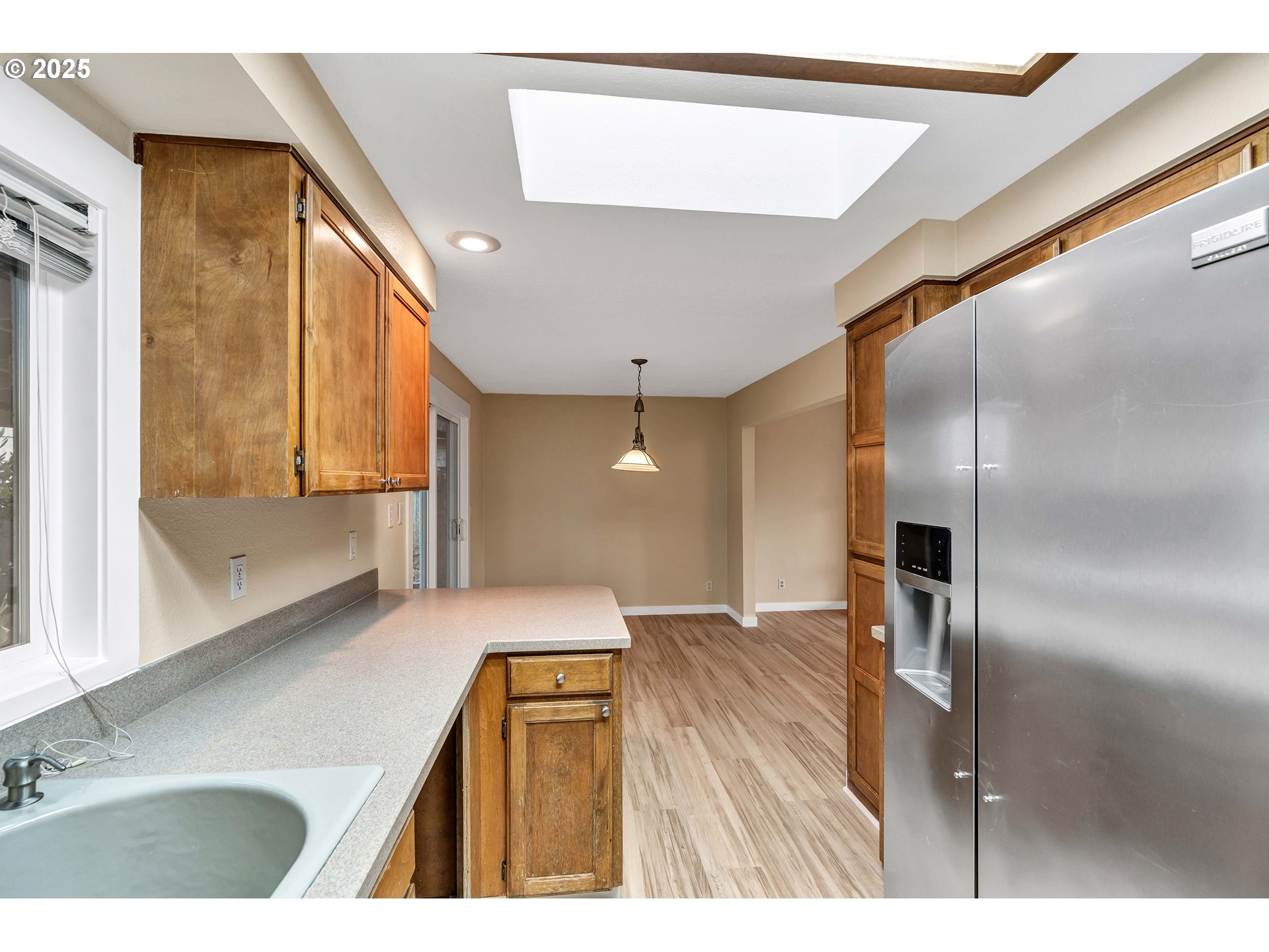 814 Northeast 196th Avenue Portland, OR 97230 - Photo 13 of 44 a bathroom with a sink a large mirror and a shower