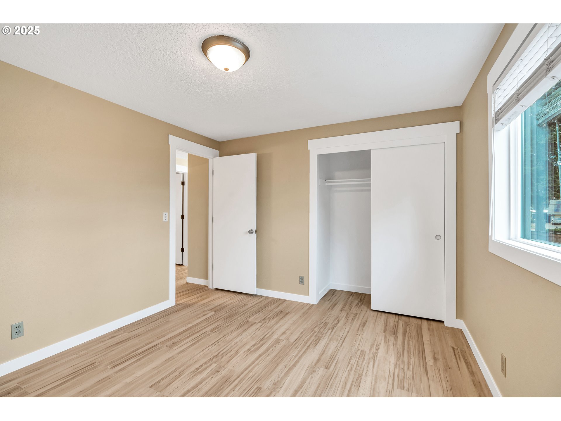 814 Northeast 196th Avenue Portland, OR 97230 - Photo 18 of 44 a empty room with wooden floor