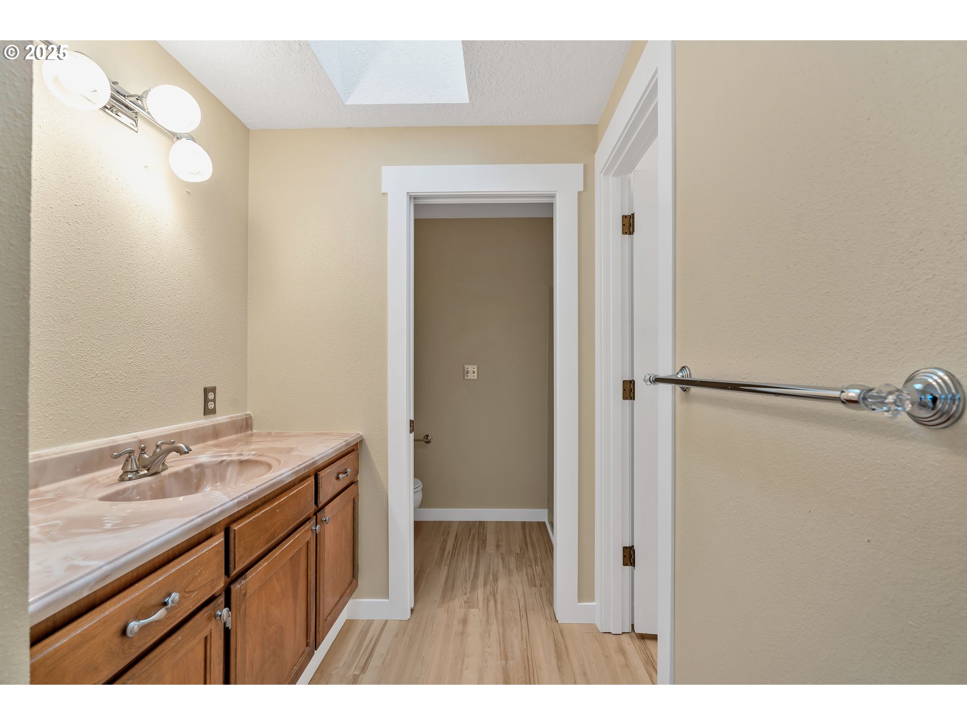 814 Northeast 196th Avenue Portland, OR 97230 - Photo 22 of 44 a bathroom with a sink a mirror and a shower