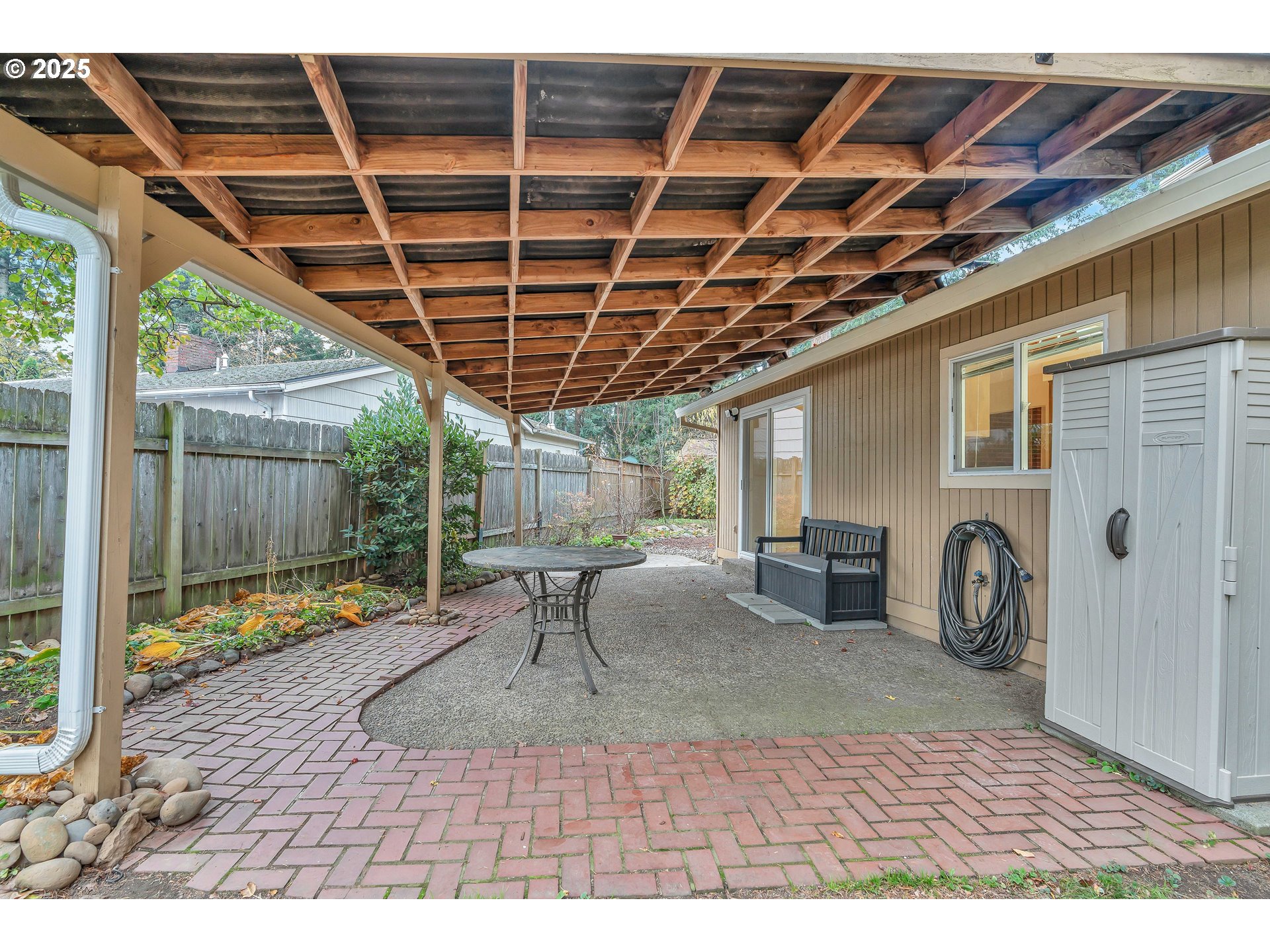 814 Northeast 196th Avenue Portland, OR 97230 - Photo 30 of 44 a view of a porch with a table and chairs